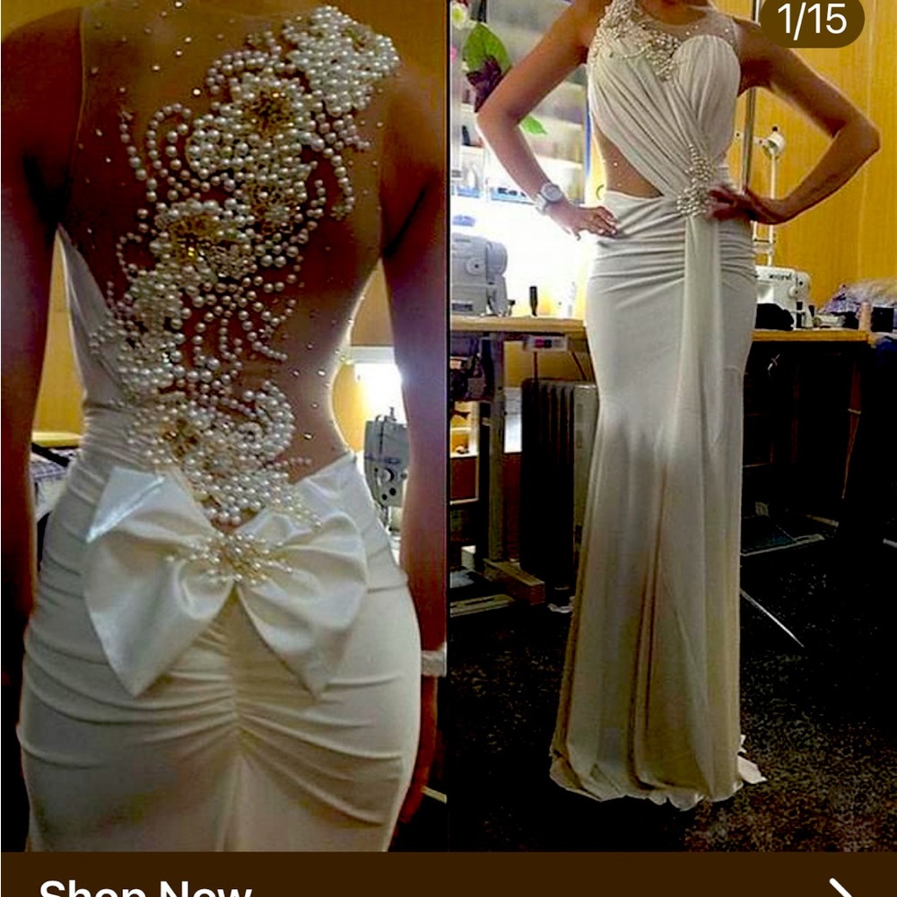Gorgeous beaded wedding gown.I lost the bow during a move but is brand new.